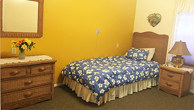 One of the senior care bedrooms within the senior care homes at Eden Adult Care Facility in Mesa Arizona